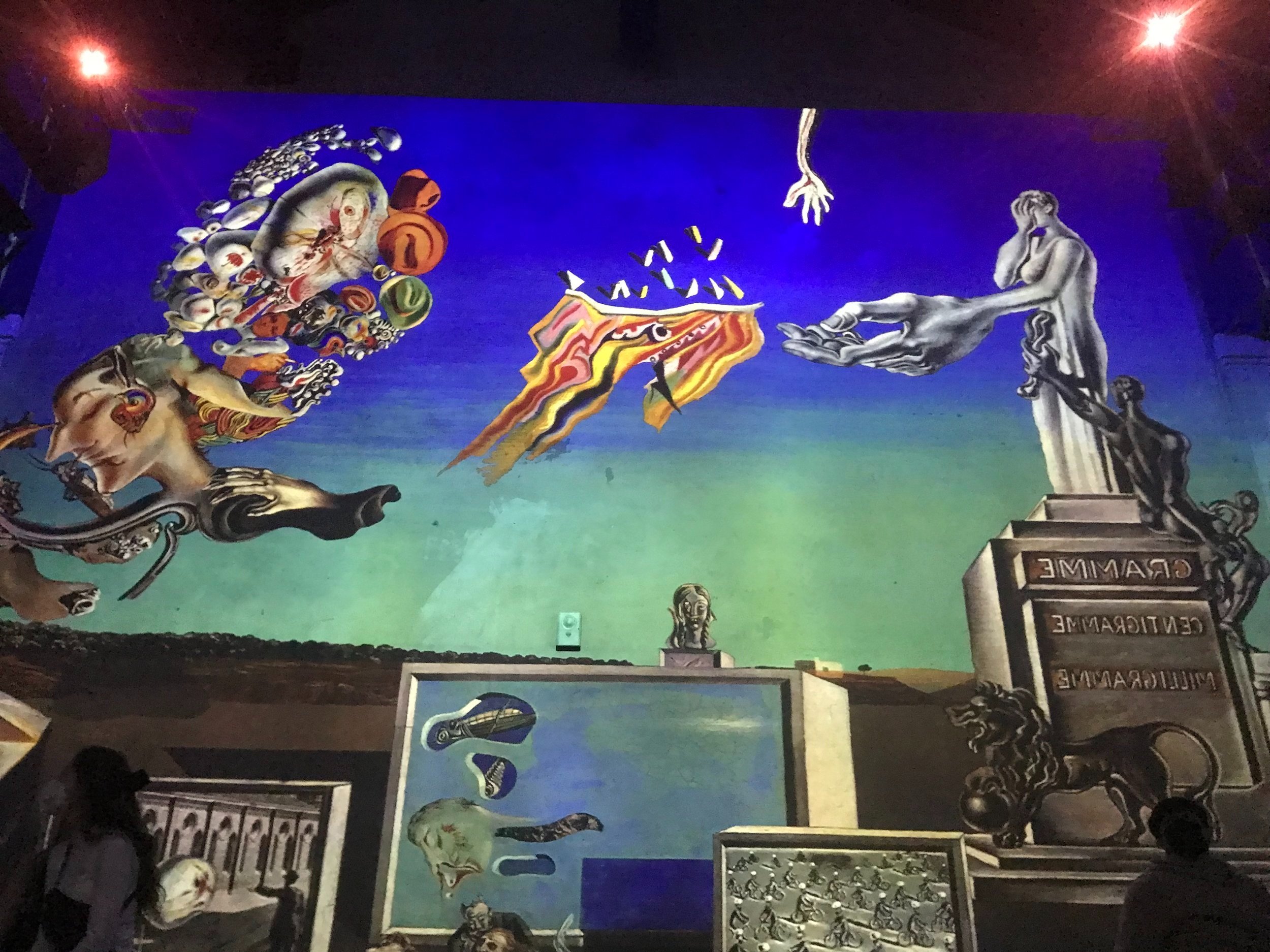 This a really awesome gallery of two famous artists (Dali and Gaudi) with music from Pink Floyd. It take some of their most famous works, and then someone (or a group of people) animates them to form a really cool 30 minute show of floor to ceiling a